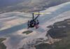 Rainbow ‘tourists’ leap from chopper, on purpose